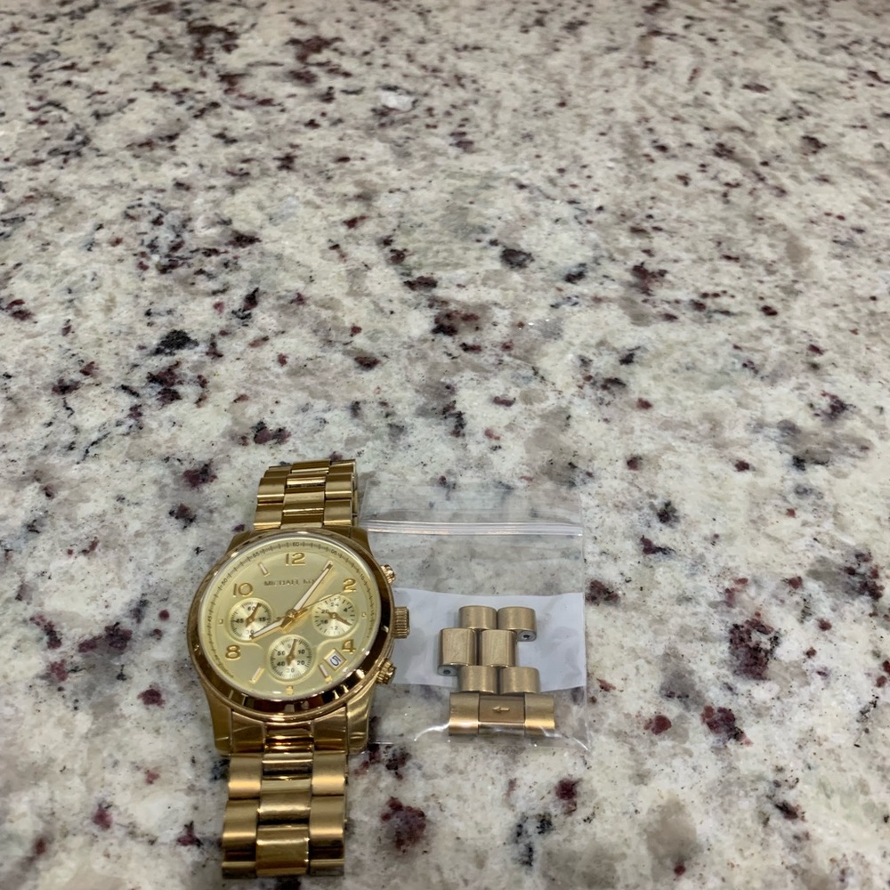 MK oversized gold tone watch